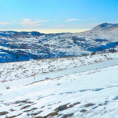 P1170359   In primo piano la pista di fondo. Foschia sulla Valpadana.